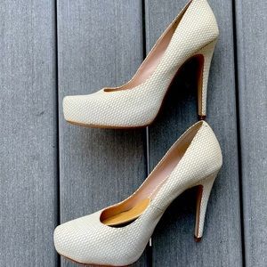 A pair of cream 3 1/2 inch BCBG heels. Barely worn